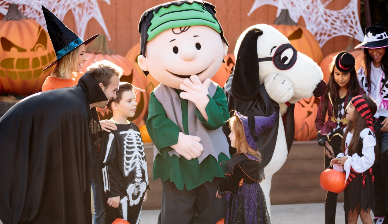 Costumed guests with Charlie Brown and Snoopy characters